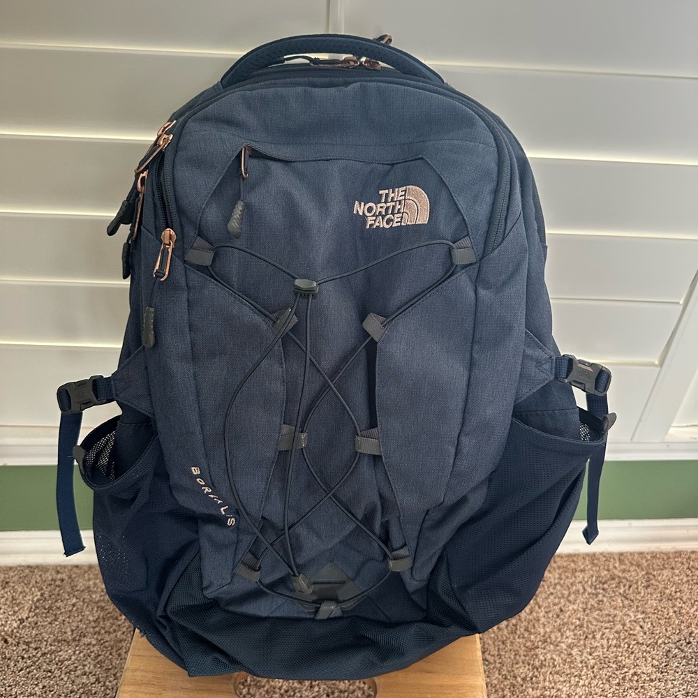 The North Face Dark Blue and Rose Gold Backpack